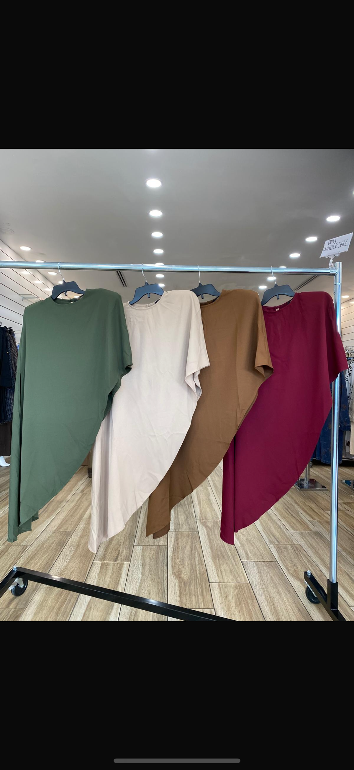 Shoulder padded asymmetric blouse